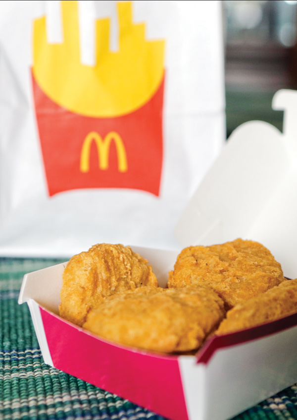 An order of McDonald’s Chicken McNuggets is displayed for a photo. McDonald’s says it plans to start using chicken raised without antibiotics important to human medicine and milk from cows that are not treated with the artificial growth hormone rbST.