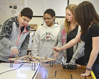 Katie Rickman | The Vindicator.Students of the STEM class at Canfield Middle School experiment with a drone that they recently made, L-R Gio Saadey 13, Destini Cospy 13, Schalysse Theisler 14, and Maddy Murphy 13.