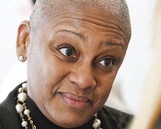        ROBERT K. YOSAY  | THE VINDICATOR.. Dr  Michelle McCollin ..50 books were donated to Discovery at Volney school Thursday by the Youngstown Alumnae Chapter of Delta Sigma Theta Sorority, Inc. The sorority also donated a $250 check which Principal Misha Scott said will be used to by more books for the school.