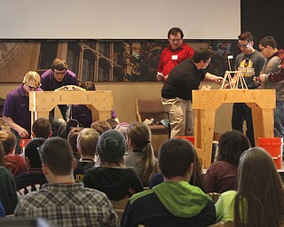        ROBERT K. YOSAY  | THE VINDICATOR....Thirty-five teams from 18 area high schools did thier best at building the best foot-long balsa-wood bridge at the 8th annual Miniature Bridge Building Competition Friday, Feb. 27, in Kilcawley Center at Youngstown State University..