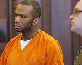        ROBERT K. YOSAY  | THE VINDICATOR..Larry Johnson, 40, of Shelby Road, sentenced to 15 years to life in prison today in Mahoning County Common Pleas Court for the New Years Eve 2013 beating and stabbing death of his 26-year-old girlfriend, LaShea Parker, inside their home - Lou DeFabio was his attorney