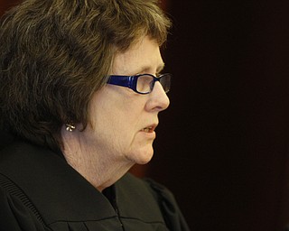        ROBERT K. YOSAY  | THE VINDICATOR..Larry Johnson, 40, of Shelby Road, sentenced to 15 years to life in prison today in Mahoning County Common Pleas Court for the New Years Eve 2013 beating and stabbing death of his 26-year-old girlfriend, LaShea Parker, inside their home - Lou DeFabio was his attorney