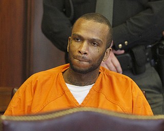        ROBERT K. YOSAY  | THE VINDICATOR..Larry Johnson, 40, of Shelby Road, sentenced to 15 years to life in prison today in Mahoning County Common Pleas Court for the New Years Eve 2013 beating and stabbing death of his 26-year-old girlfriend, LaShea Parker, inside their home - Lou DeFabio was his attorney