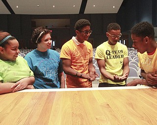 William D. Leiws The Vindicator  East hS students work on an anti bullying skit. l-r they are Kayla Mitchell, 12th grader, Alexis Palumbo, 9th grade, Darneal Lewis, 9th grade, Reginald Allen, 12th and Trey Ingram, 12th grade.
