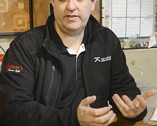 Katie Rickman | The Vindicator.Jason Gartland, Coffee Specialist at Marlowe's Premium Coffee Service discusses the unique quality service of Marlowe's on March 4, 2015.