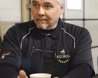 Katie Rickman | The Vindicator.Rich Cancio, The Coffee Guy for Marlowe's Premium Coffee Service discusses the benefits of Keurig products on March 4, 2015.
