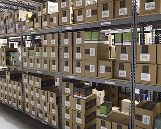 Katie Rickman | The Vindicator.Boxes of Keurig K-Cups are stacked in the distribution warehouse of Marlowe's Premium Coffee Service in Canfield on March 4, 2015.  Marlowe's is now providing Keurig coffee to YSU.