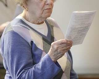 Katie Rickman | The Vindicator.Alice Hartig of Poland TWP signs along during the Lenten service at Bethel Lutheran Church in Boardman on March 4, 2015.