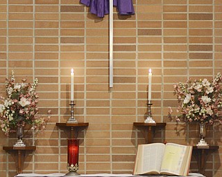 Katie Rickman | The Vindicator.Candels are lit for the noon Lenten service at Bethel Lutheran Church in Boardman on March 4, 2015.