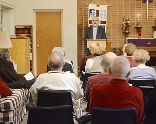Katie Rickman | The Vindicator.Pastor Richard Kidd preaches to a small group at the noon Lenten service at Bethel Lutheran Church on March 4, 2015.