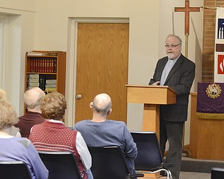 Katie Rickman | The Vindicator.Pastor Richard Kidd preaches to a small group at the noon Lenten service at Bethel Lutheran Church on March 4, 2015.