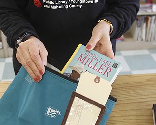        ROBERT K. YOSAY  | THE VINDICATOR..books  etc to be mailed out to shut-ins - a service the library is expanding to new mothers and to all senior citizens over 65, who find it difficult to get to a library, especially in inclement weather.  ..