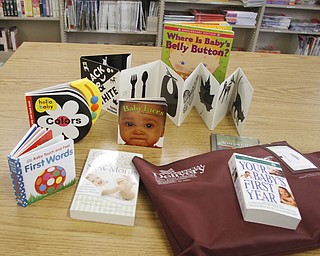        ROBERT K. YOSAY  | THE VINDICATOR..books  etc to be mailed out to shut-ins - a service the library is expanding to new mothers and to all senior citizens over 65, who find it difficult to get to a library, especially in inclement weather.  ..