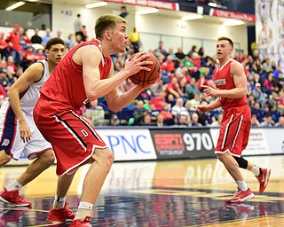 PITTSBURGH, PENNSYLVANIA - MARCH 7, 2015:  Peyton Aldridge #23 of Davidson looks for a teammate to pass the ball to after grabbing a rebound during the 2nd half of Saturday nights game against Duquesne at the Palumbo Center. (Photo by David Dermer/Youngstown Vindicator)