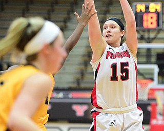 YOUNGSTOWN, OHIO - MARCH 7, 2015: Heidi Schlegel #15 of YSU shoots a 3 point over during the 1st half of Saturday afternoons NCAA basketball game at Beeghly Center. (Photo by David Dermer/Youngstown Vindicator)