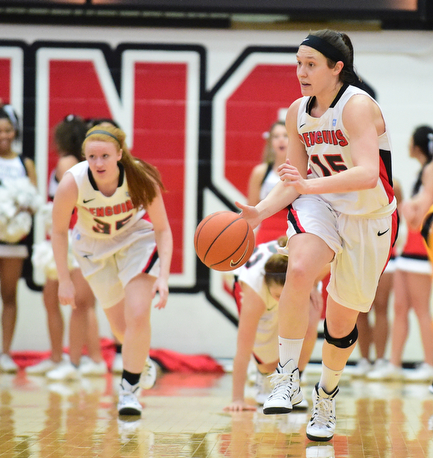 YOUNGSTOWN, OHIO - MARCH 7, 2015: Heidi Schlegel #15 of YSU dribbles up court after a Valpo turnover during the 1st half of Saturday afternoons NCAA basketball game at Beeghly Center. (Photo by David Dermer/Youngstown Vindicator)