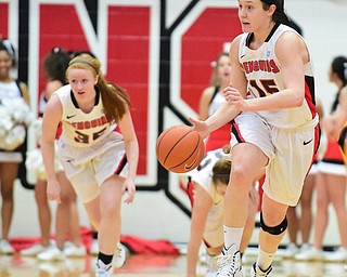 YOUNGSTOWN, OHIO - MARCH 7, 2015: Heidi Schlegel #15 of YSU dribbles up court after a Valpo turnover during the 1st half of Saturday afternoons NCAA basketball game at Beeghly Center. (Photo by David Dermer/Youngstown Vindicator)