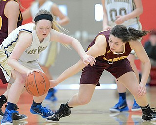 Jeff Lange | The Vindicator  South Range's Marketta Gabriel (right) steals the ball away from Brookfield's Madison Bellis during second half action of their game, Saturday night in Struthers.