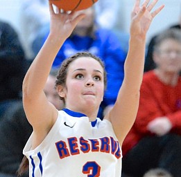 Jeff Lange | The Vindicator  Reserve's Lauren Falasca attempts a three point shot during fourth quarter action of Reserve's game against Jackson Milton, Saturday at Mineral Ridge.