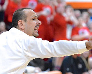 Jeff Lange | The Vindicator  Reserve head coach Steve Miller coaches his girls in the final seconds of Reserve's game against Jackson Milton at Mineral Ridge High School, Saturday.