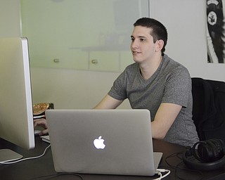 Katie Rickman | The Vindicator.Aaron Womer of Austintown is a programmer for Drund where he focuses mainly on programming for Android platforms.