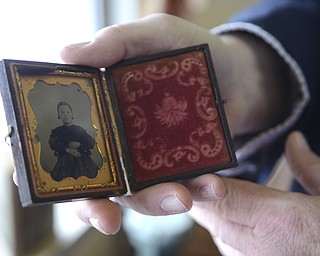 Katie Rickman | The Vindicator.A vintage photo of an unknown woman is one of the many displays at the Beaver TWP. Historical Society at the new location at The North Lima Business Complex in North Lima on March 5, 2015.
