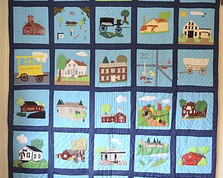 Katie Rickman | The Vindicator.A vintage quilt hangs on a wall at the Beaver TWP. Historical Society at the new location at The North Lima Business Complex in North Lima on March 5, 2015. The quilt shows various locations throughout the township.