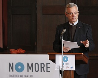        ROBERT K. YOSAY  | THE VINDICATOR..Jim Tressel YSU president ..Speakers at VIP Family Violence Prevention CoalitionÕs Partnership with the National NO MORE PSA campaign. at St Johns Episcopal Church ..Jim Tressel, YSU pres, and Danielle Cantrell, vice pres Cortland Banks, domestic violence survivor.Vince M. Brancaccio- Help Hotline ...