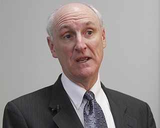        ROBERT K. YOSAY  | THE VINDICATOR..Ralph T Meacham... responds to remarks by Carol McFall, long-time chief deputy Mahoning County auditor, who was fired Wednesday by the new Auditor Ralph T. Meacham, speaks to the press in front of her former courthouse office...