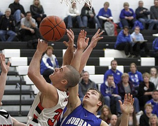 Fight for the ball as Canfields #34 Vince Leone grabs the ball from  Hubbards #25 Travis Kopanic. ROBERT  K. YOSAY | THE VINDICATOR