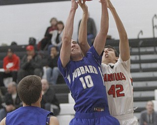 Hubbards #10  Tyler Hodge Takes the ball from Canfields #42 Sam Digiacomo during first quarter action. .ROBERT  K. YOSAY | THE VINDICATOR