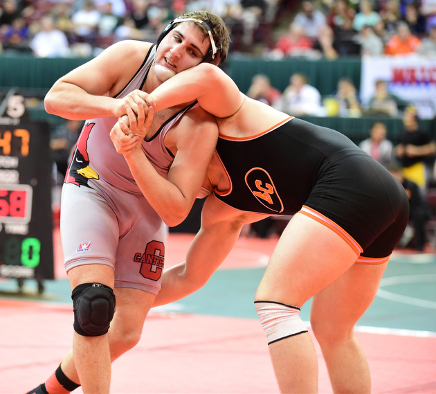 COLUMBUS, OHIO - MARCH 13, 2015: Jacob Esarco of Canfield attempts to stop the takedown attempts from Cole Genders of Amanda-Clearcreek during their 220lb championship round bout Friday night at Schottenstein Center. (Photo by David Dermer/Youngstown Vindicator)