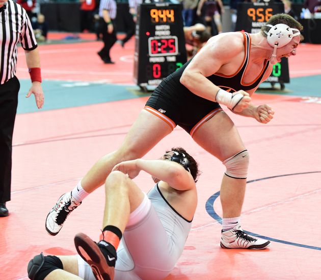 COLUMBUS, OHIO - MARCH 13, 2015: Cole Genders of Amanda-Clearcreek celebrates as time epires after beating Jacob Esarco of Canfield after their 220lb championship round bout Friday night at Schottenstein Center. (Photo by David Dermer/Youngstown Vindicator)