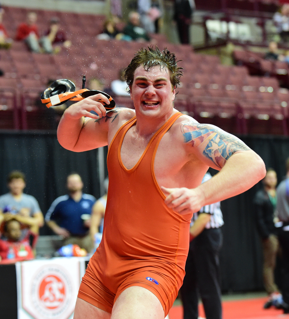 COLUMBUS, OHIO - MARCH 13, 2015: Seth Bloor of Wellsville celebrates after beating Jon Bodkin of Martins Ferry in their 285lb championship round bout Friday night at Schottenstein Center. (Photo by David Dermer/Youngstown Vindicator)