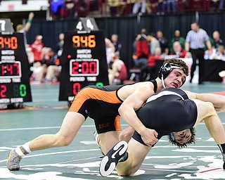 COLUMBUS, OHIO - MARCH 13, 2015: David-Brian Whisler of Howland takes the back of Russell Miller of Miami Trace during their 170lb championship round bout Friday night at Schottenstein Center. (Photo by David Dermer/Youngstown Vindicator)