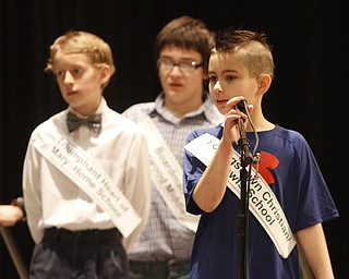       .         ROBERT  K. YOSAY | THE VINDICATOR..Luke Martinucci -Youngstown Christian/Lewis School - behind them is Shane Hetzel   Devin Holt and  listens to the first word -The 82nd Regional Spelling Bee at Kilcawley Room at YSU .saw a repeat from last year as Annabelle Day bested over 50 other spellers Saturday Morning....-30-