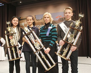       .         ROBERT  K. YOSAY | THE VINDICATOR..and the winners are --- 2nd place from Canfield  Village Middle School Jessica Lee- Annabelle Day  from  Willow Creek Learning Center Judge  Carol Ryan - and third place winner according to the judges -  Ryan Station ..The 82nd Regional Spelling Bee at Kilcawley Room at YSU .saw a repeat from last year as Annabelle Day bested over 50 other spellers Saturday Morning....-30-