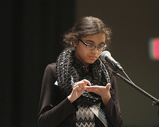       .         ROBERT  K. YOSAY | THE VINDICATOR..Marisa Mohapatra  of Akiva Academy writes the word out on her hand..The 82nd Regional Spelling Bee at Kilcawley Room at YSU .saw a repeat from last year as Annabelle Day bested over 50 other spellers Saturday Morning....-30-