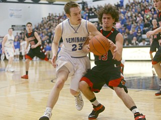 Mike Capps | The Vindicator.Both Poland and Canfield defenses played very aggressively as PolandÕs Jared Burkert (23) and John French (13) of Canfield fight for the ball.