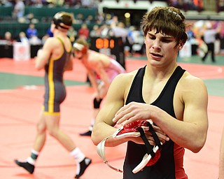 COLUMBUS, OHIO - MARCH 14, 2015: Georgio Poullas of Canfield walks to the bench after losing his 126lbs Division 2 consolation round bout Saturday morning at Schottenstein Center. (Photo by David Dermer/Youngstown Vindicator)