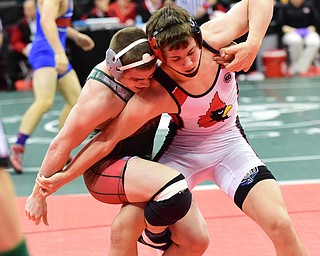 COLUMBUS, OHIO - MARCH 14, 2015: David Crawford of Canfield fights to free himself front he grasp of Josh Missing of Toledo Central Catholic during their 152lb Division 2 consolation round bout Saturday morning at Schottenstein Center. (Photo by David Dermer/Youngstown Vindicator)