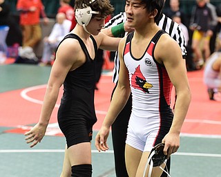 COLUMBUS, OHIO - MARCH 14, 2015: Matthew Cardello of Canfield reacts after being pinned by Eric Bartos of Medina Buckeye during their 106lb Division 2 consolation round bout Saturday morning at Schottenstein Center. (Photo by David Dermer/Youngstown Vindicator)