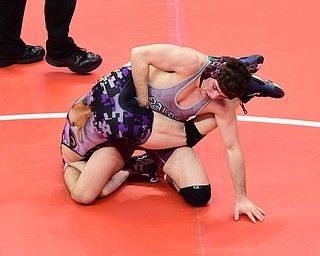 COLUMBUS, OHIO - MARCH 14, 2015: Anthony Mancini of Boardman attempts to free his arm from the control of Travid Leopold of Avon during their 160lb Division 1 consolation round bout Saturday morning at Schottenstein Center. (Photo by David Dermer/Youngstown Vindicator)