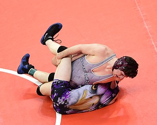 COLUMBUS, OHIO - MARCH 14, 2015: Anthony Mancini of Boardman attempts to work Travis Leopold of Avon to his back during their 160lb Division 1 consolation round bout Saturday morning at Schottenstein Center. (Photo by David Dermer/Youngstown Vindicator)