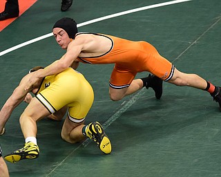 COLUMBUS, OHIO - MARCH 14, 2015: Jordan Radich of Howland takes the back of Luke Matthews of Shawnee during their 182lb Division 2 consolation round bout Saturday morning at Schottenstein Center. (Photo by David Dermer/Youngstown Vindicator)