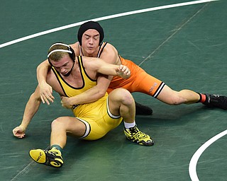 COLUMBUS, OHIO - MARCH 14, 2015: Jordan Radich of Howland controls the back of Luke Matthews of Shawnee during their 182lb Division 2 consolation round bout Saturday morning at Schottenstein Center. (Photo by David Dermer/Youngstown Vindicator)