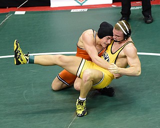 COLUMBUS, OHIO - MARCH 14, 2015: Jordan Radich of Howland takes down Luke Matthews of Shawnee during their 182lb Division 2 consolation round bout Saturday morning at Schottenstein Center. (Photo by David Dermer/Youngstown Vindicator)
