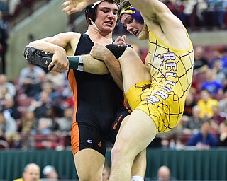 COLUMBUS, OHIO - MARCH 14, 2015: David-Brian Whisler of Howland kicks the leg out from under Benjamin Schram of Bellbrook during their 170lb Division 2 championship round bout Saturday night at Schottenstein Center. (Photo by David Dermer/Youngstown Vindicator)