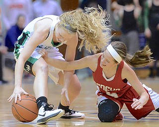 Jeff Lange | The Vindicator  Geneva's Emily Harriman (right) dives for the ball as Melinda Trimmer scrambles to recover possession in the first half of the Lady Warriors game held at Barberton High School, Saturday afternoon. West Branch beat Geneva 50-30