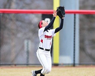 YOUNGSTOWN, OHIO - MARCH 20, 2015: Right fielder Cali Mikovich #4 of YSU gets under a fly ball for the first out in the top of the 3rd inning during Friday evenings game at the YSU Softball Complex.(Photo by David Dermer/Youngstown Vindicator)